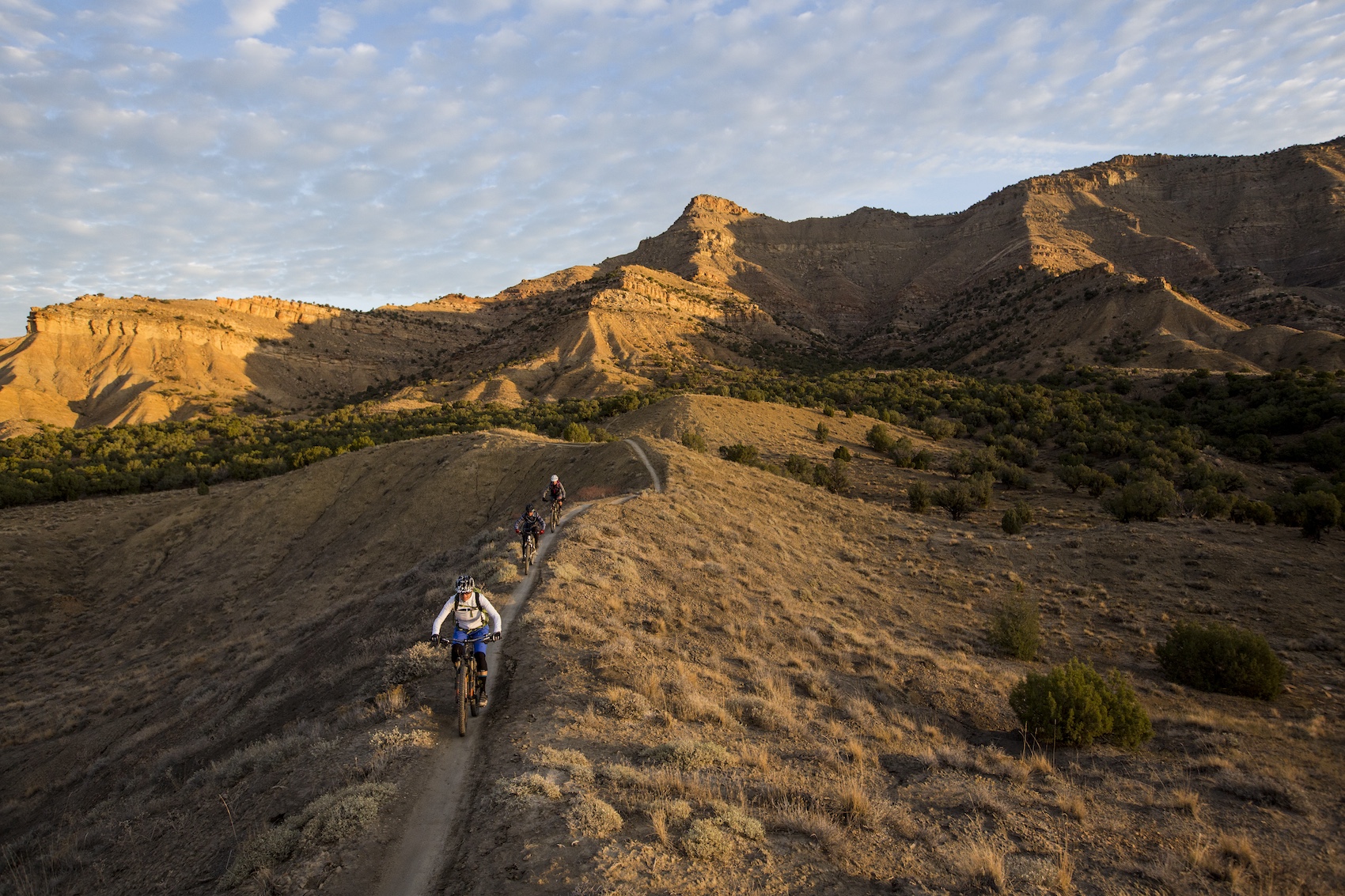 Group of mountain bikers riding at an IMBA Ride Center Destination