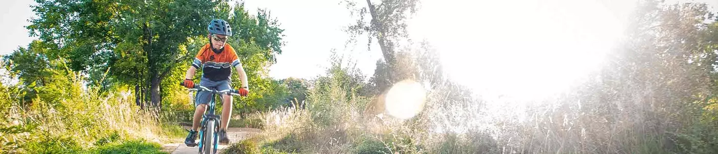 mountain biker riding in a field