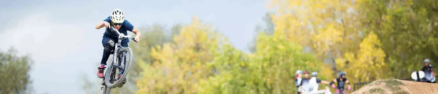mountain biker riding in a field