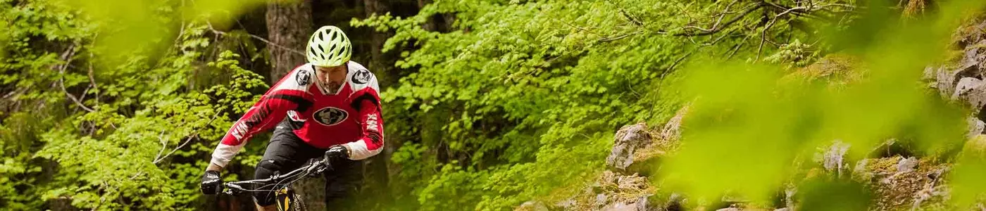 mountain biker riding in a field