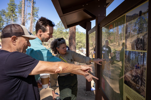 National Forest and IMBA Trail Labs attendees review a trail map. 