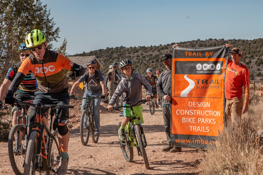Group of mountain bikers riding at a trail opening in Cedar City, UT. 