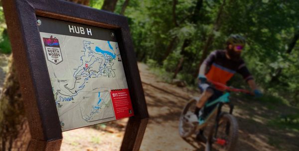 Trail signs at Bean Peaks trail system, created by IMBA Trail solutions. 